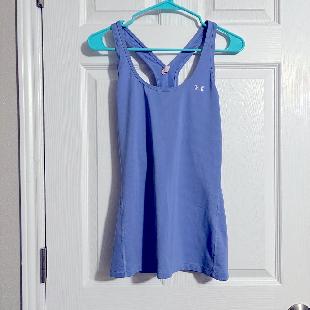 Pale blue Under Amour sleeveless cross back workout shirt. Good condition.